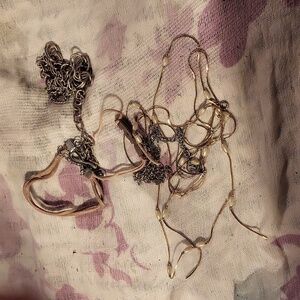 Pile of broken chains and random jewelry